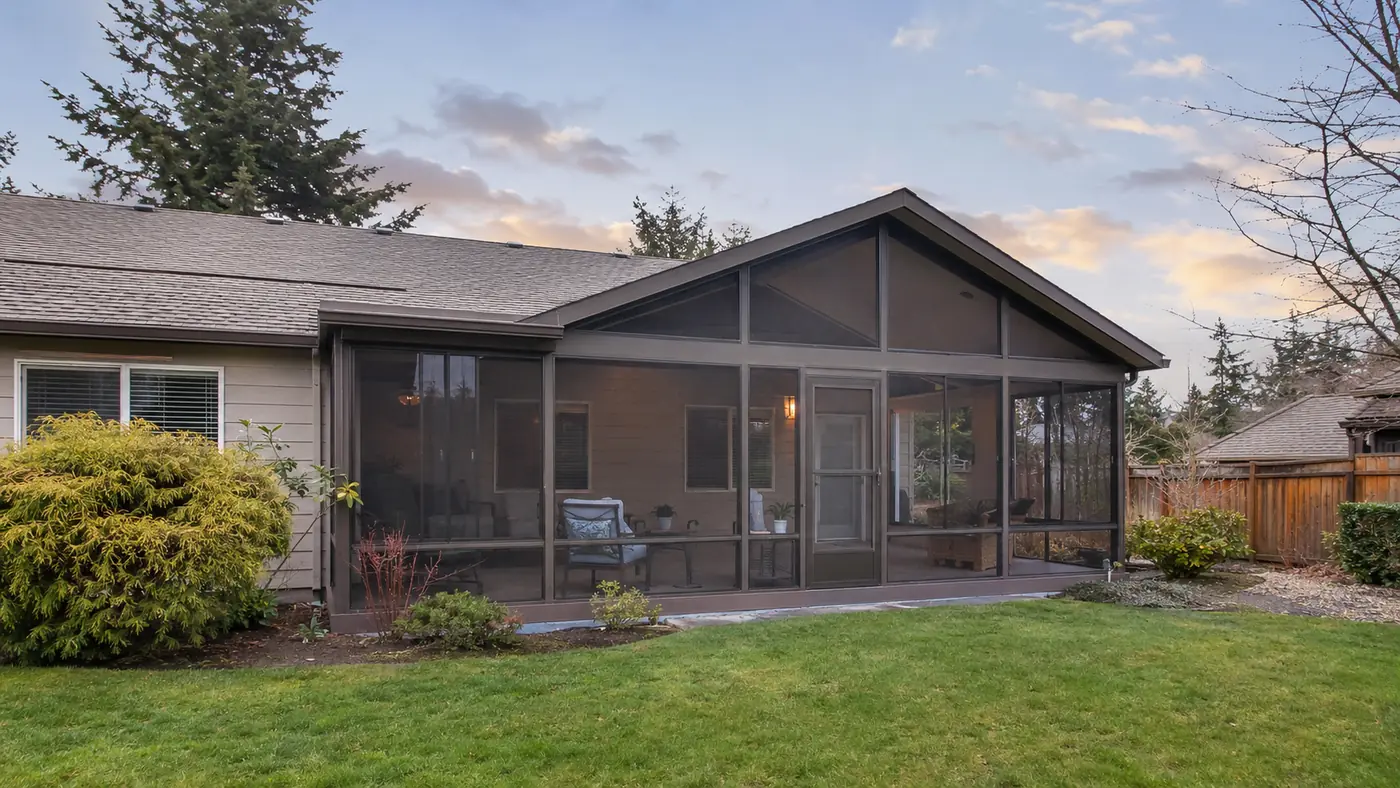 Screened porch on a gray home Screened-in porch on a gray house in Salem, OR